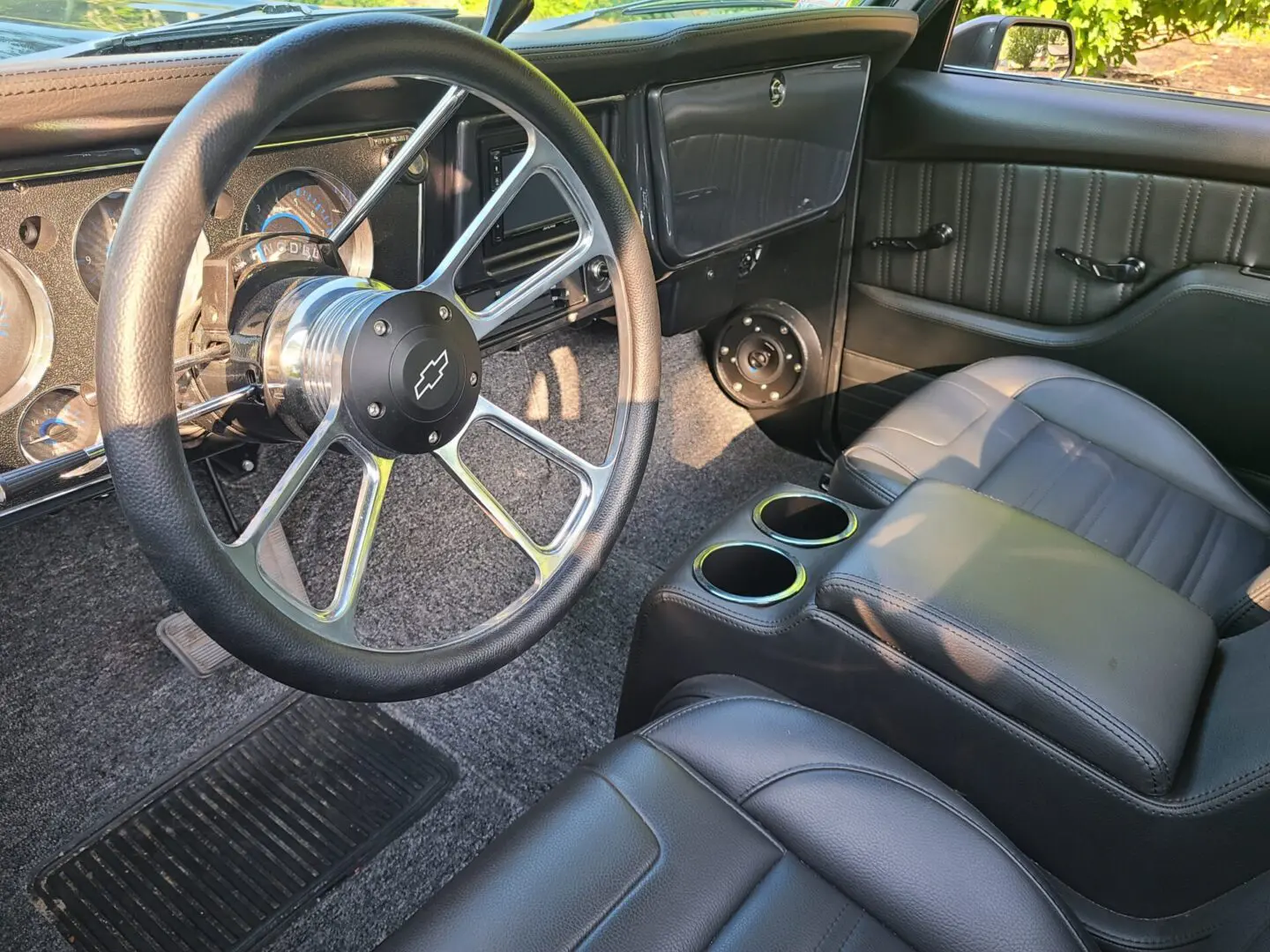 A car with some leather seats and a steering wheel